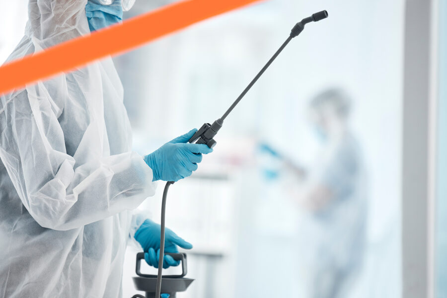 Hospital, cleaning and covid sanitation by professional cleaner spray, disinfect and bacteria preve.