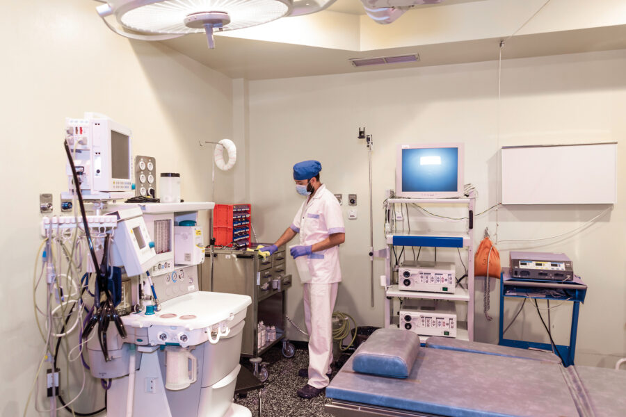 cleaning staff performing disinfection and hygiene work in hospital facilities